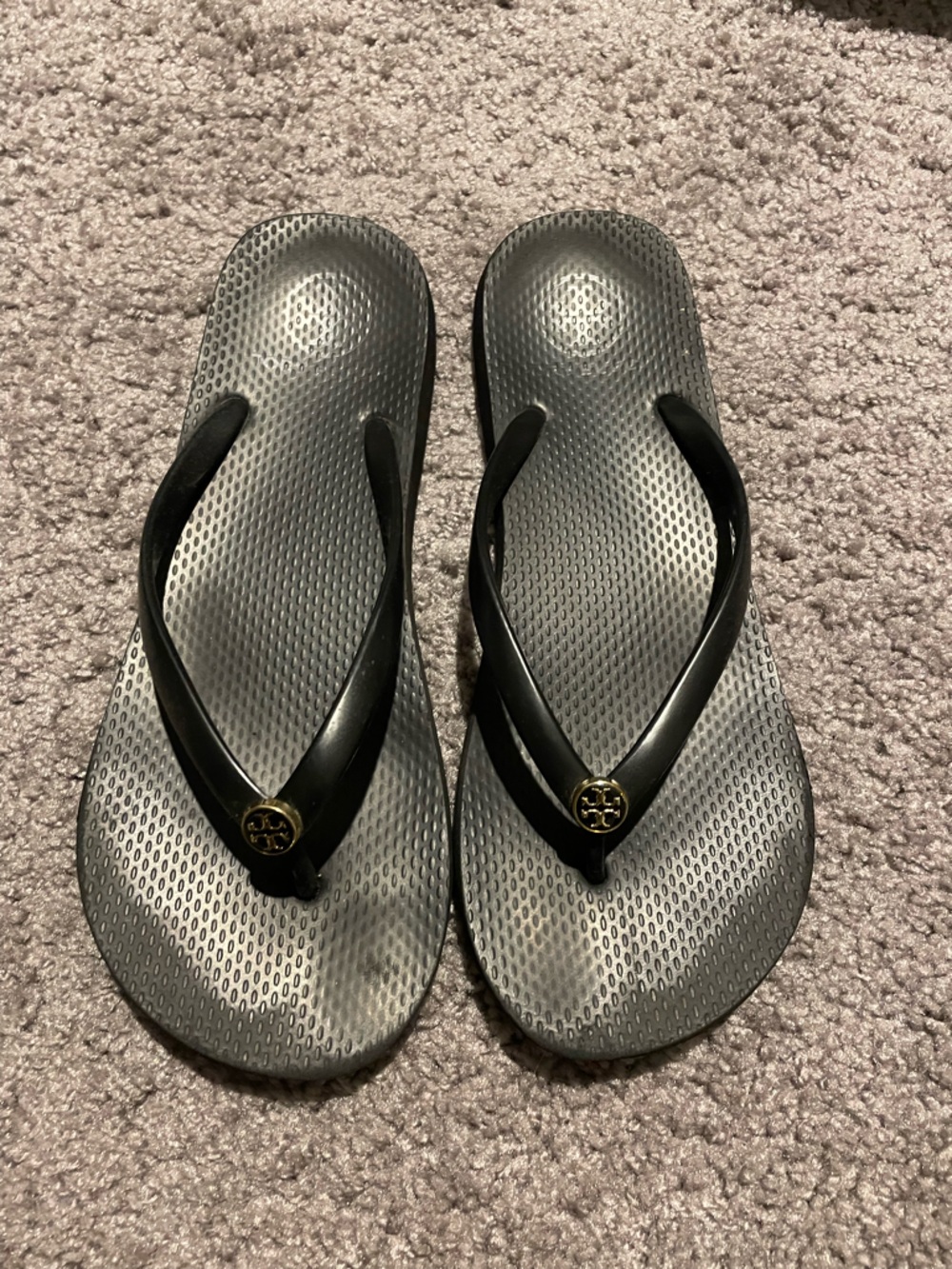 Tory Burch Black Flip Flop Sandals with Gold Logo Medallions